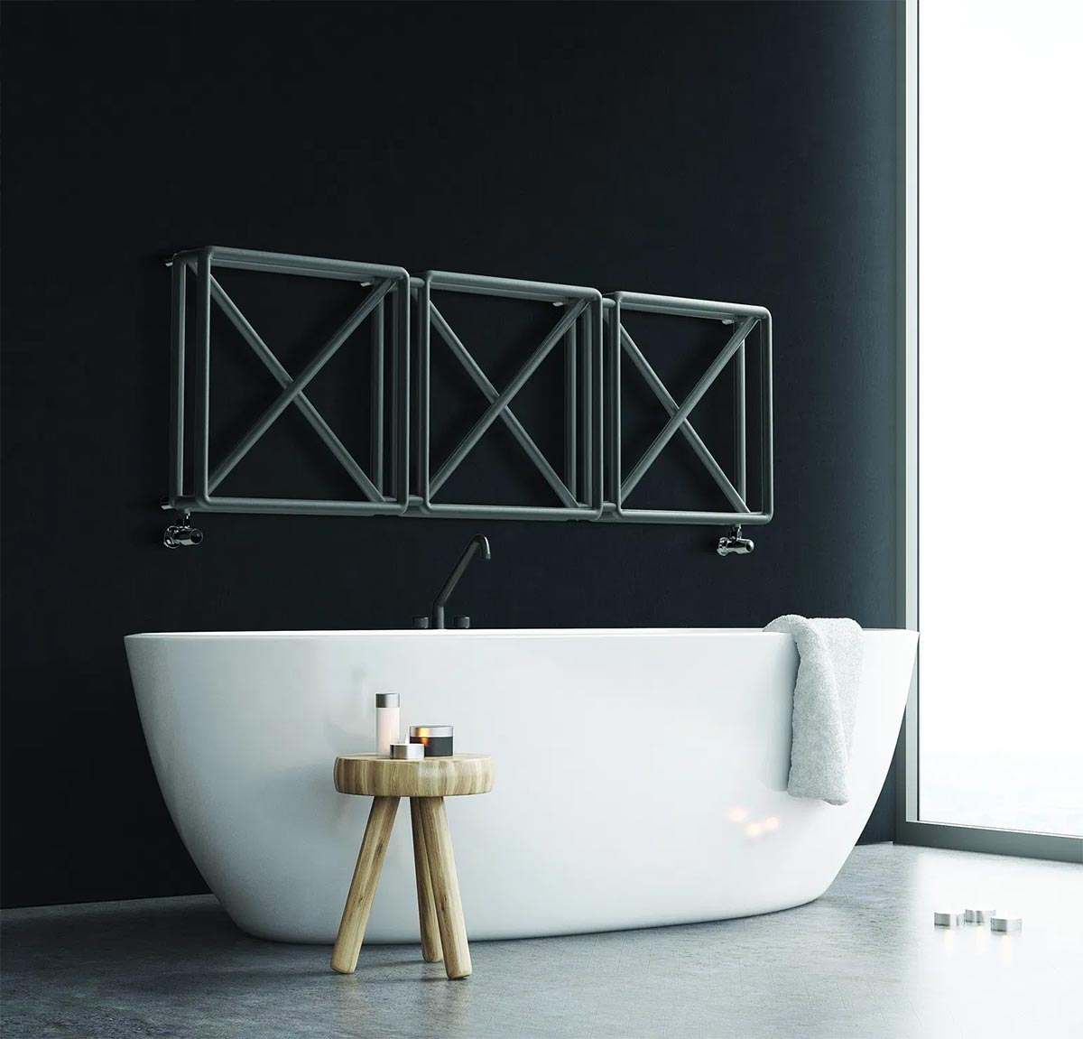 calorifero di design con tubi a geometria intrecciata color grigio scuro
